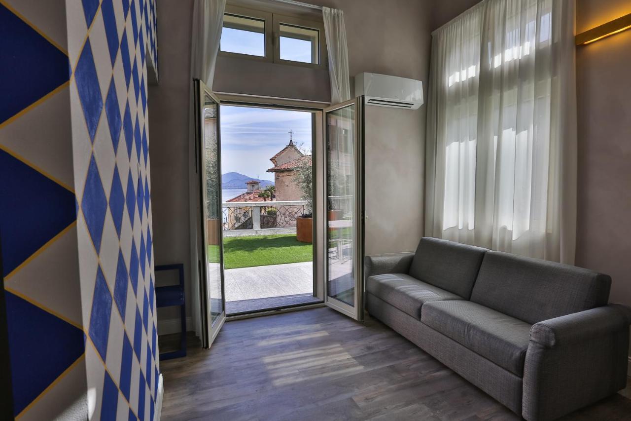 Hotel Al Campanile - Luxury Suites & Apartments บาเวโน ภายนอก รูปภาพ