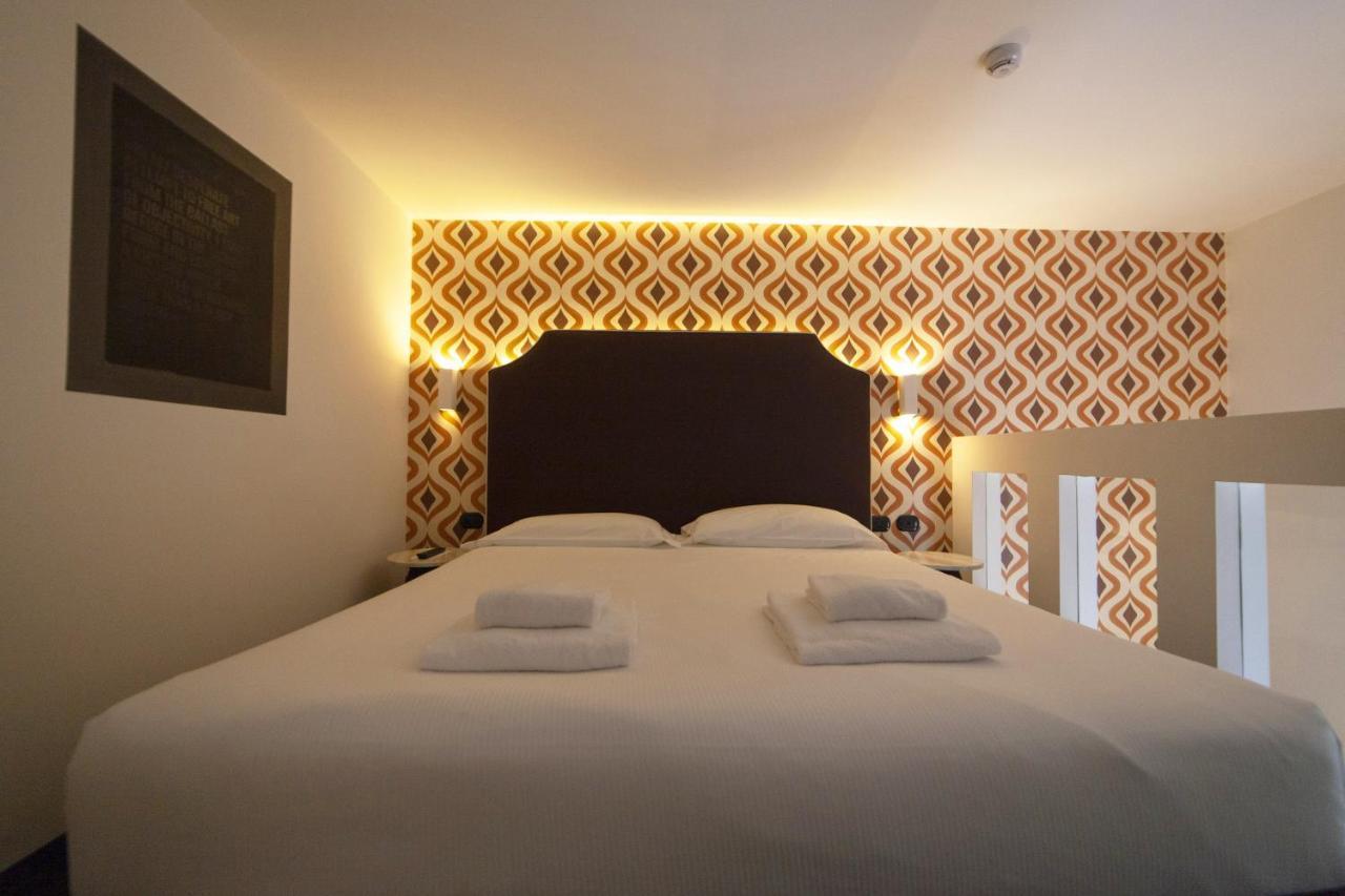 Hotel Al Campanile - Luxury Suites & Apartments บาเวโน ภายนอก รูปภาพ