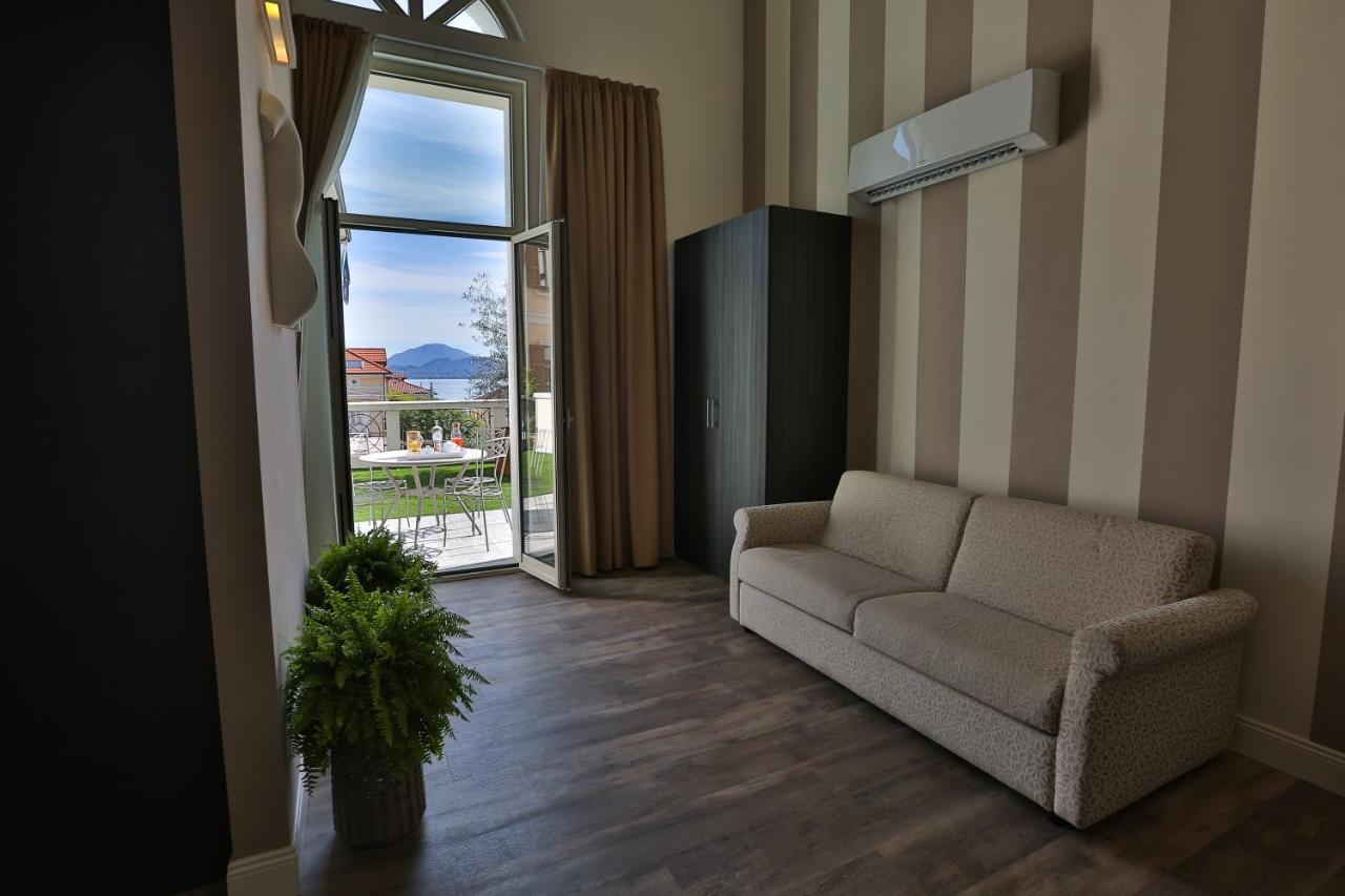 Hotel Al Campanile - Luxury Suites & Apartments บาเวโน ภายนอก รูปภาพ