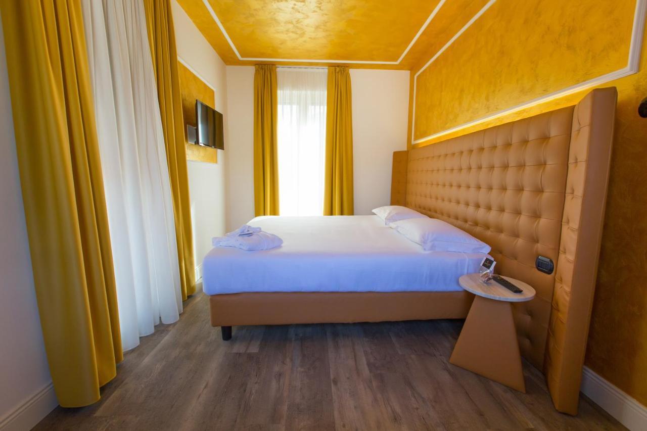 Hotel Al Campanile - Luxury Suites & Apartments บาเวโน ภายนอก รูปภาพ