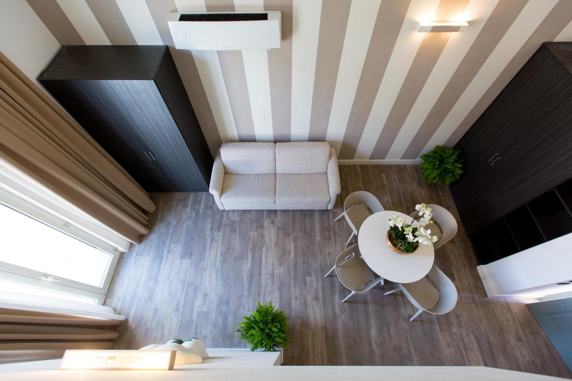 Hotel Al Campanile - Luxury Suites & Apartments บาเวโน ภายนอก รูปภาพ