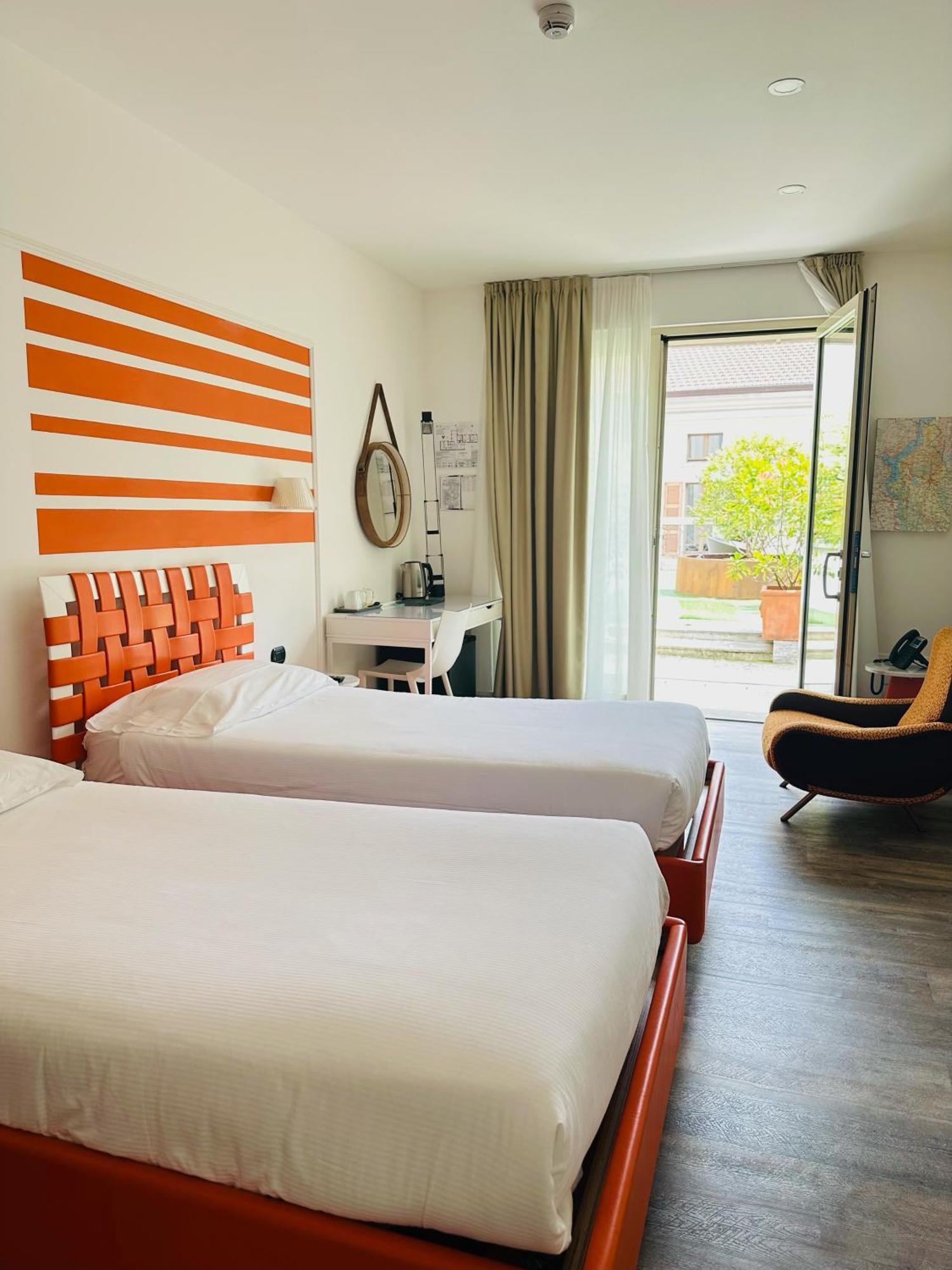 Hotel Al Campanile - Luxury Suites & Apartments บาเวโน ภายนอก รูปภาพ