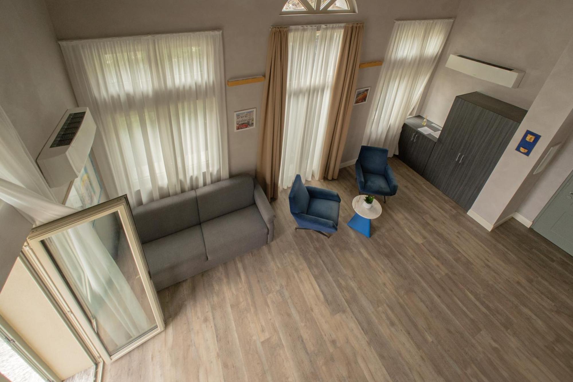 Hotel Al Campanile - Luxury Suites & Apartments บาเวโน ภายนอก รูปภาพ